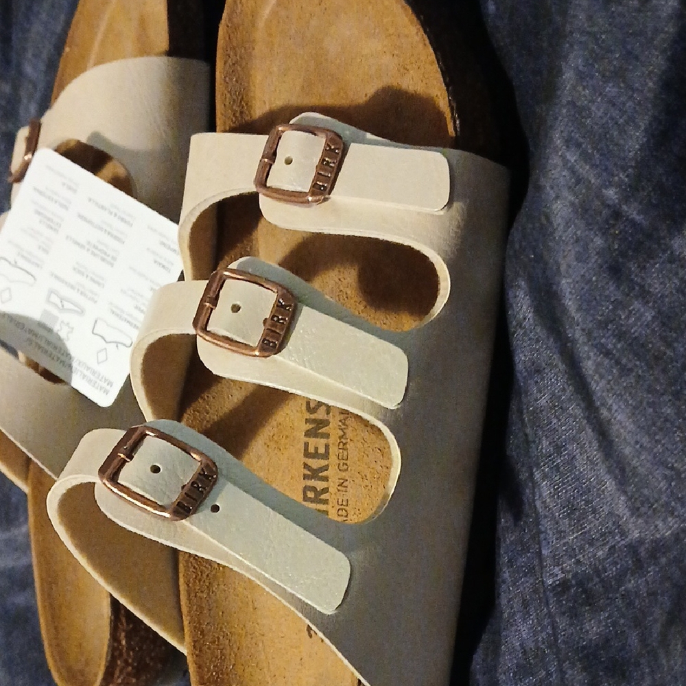 Birkenstock Cream Sandals with Triple Buckles